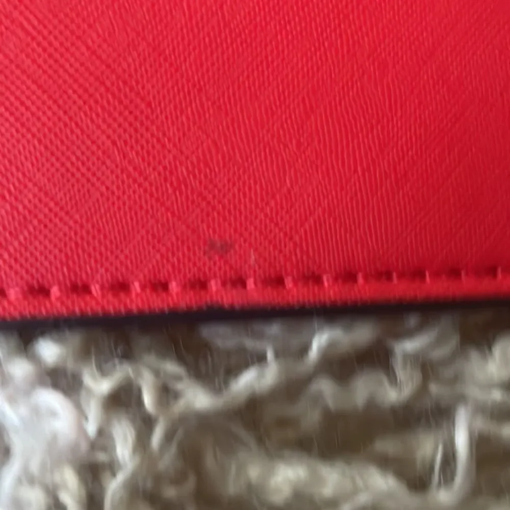 Kate Spade ORANGE MEDIUM ZIP WRISTLET